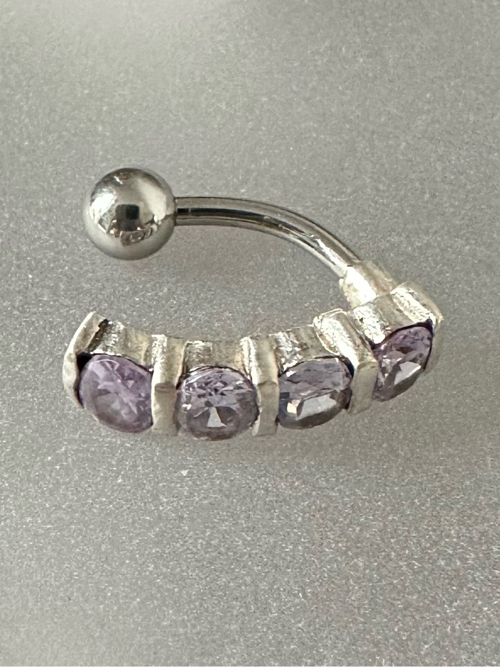 Sterling silver and stainless steel belly button ring with light purple stones